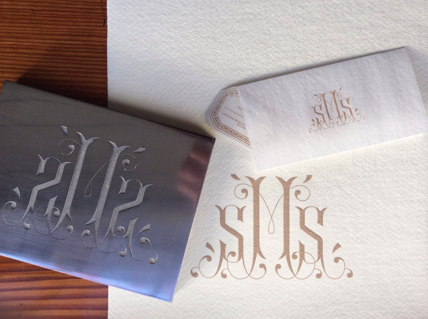 Hand engraved steel die and prints of it. Details are in the caption beneath the image.