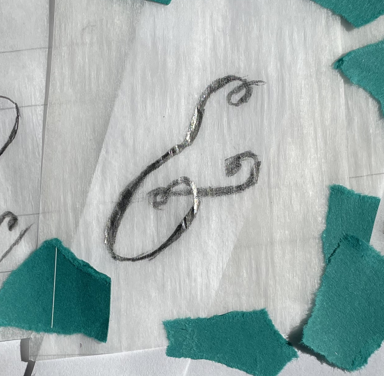 Hand-drawn custom lettering sample of an ampersand.